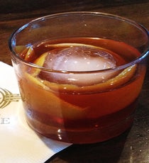 The Gage: Fall Old Fashioned
2 oz Rittenhouse Rye 100p
1 oz Blis Maple Syrup Mix (syrup and cherry orange water)
3 dashes Angostura bitters
2 strips of lemon peel
2 strips of orange peel
Put citrus peels in rocks glass. Add ice ball, rye, syrup mix, and bitters. Stir in glass for a few seconds.
This is a spin off of the classic Old Fashioned, which combined Rye, sugar, bitters and citrus. The Blis maple syrup is from Michigan, where it is aged in old bourbon barrels. Because it is super sweet and viscous, it has been cut with a cherry orange water. The water is cooked sous vide with orange peels and dried cherries at a controlled temperature to prevent any bitterness from overcooking the citrus. This drink is quite strong.
The Gage, 24 South Michigan Avenue (between Madison and Monroe Streets); 312-372-4243
Photo: Courtesy of The Gage
TheGage-Fall Old Fashioned