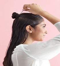 Use a small pin (or two, if you hair is really thick) to secure the bun. MultiBun_076_R
