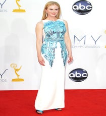 We waited with bated breath for Nicole Kidman's arrival, not knowing whether to expect a safe bet or absolute spectacle. Luckily, it was one-hundred percent the latter when she waltzed in hand-in-hand with husband Keith Urban. Fitting for the highest wattage star in attendance, Kidman's frock, an angelic nod to TRON courtesy of Antonio Berardi, just debuted on the runway a week ago at London Fashion Week, and it was such a welcome risky departure for the fair-faced Aussie. She joked that the directors of her new Grace Kelly flick wouldn't appreciate all of the red-carpet sun she was getting, but we're certainly hoping she basked in the figurative kind. Photo: Matt Baron/BEImages emmys-dresses--nicole-kidman