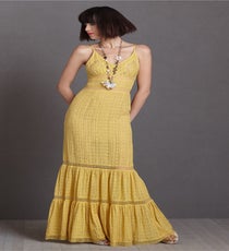 Backyard Fête — This sunny maxi dress strikes the perfect balance of laid-back luxe — making it ideal for a causal outdoor wedding. The peek-a-boo lace below the knee, coupled with a fit-to-flare silhouette, give it edge without losing that sweetness. Pair with wedges or strappy sandals; just make sure the hemline hits a half-inch above the ground.
Tracy Reese Spicy Ginger Dress, $400, available at BHLDN. tracy-reese
