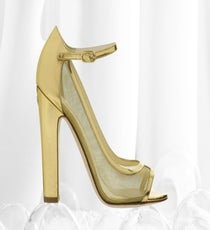 Gold calfskin peeptoe pumps are the ultimate in up-all-night glam.
Chanel Gold and mesh heel, available in Chanel stores.
Chanel-9