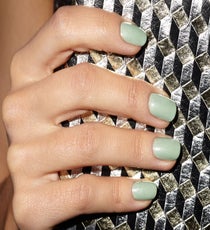 Surprisingly, this candy-colored hue flatters dark and light skin tones (and many in between). The trick, Barokas says, is in the application. "For darker skin tones, one coat is sufficient," she says. "If your skin is lighter, wear two coats so the green doesn't blend into your skin tone." 02_REFINERY_29_NAILS_DEC_SHOT_5_019_crop