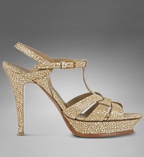 YSL Tribute High Heel Sandal in Gold Metallic Leather, $795, available at Yves Saint Laurent. YSL_Courtesy of YSL