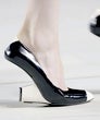 Half Steps: Jacobs Stops Short When Trying on Women's Shoes