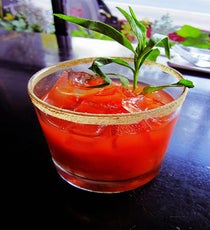More into ghouls than gore? Look no further than Napoleon Bistro, the quintessential Parisian spot in Adams Morgan, where a new specialty cocktail list puts a modern spin on Pernod absinthe, the infamous hallucinogenic liquor beloved by Ernest Hemingway and Oscar Wilde. Though it won't make you see stars these days, absinthe still packs a punch — especially in our favorite drink on the list, the "Bloody Fairy." The combo of Svedka vodka, Pernod, bloody mary mix, lemon juice, and spices makes for a classic cocktail that goes perfectly with your Gertrude Stein costume.
Where: 847 Columbia Road NW; 202-299-9630.
Photo: Courtesy of Napoleon Bistro Napoleon_The-Bloody-Fairy
