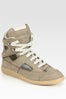 maison-martin-margiela-cut-out-sneakers-$440