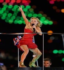 Geri Halliwell Ginger looked fabulous in a clever send-up to her iconic Union Jack dress designed by Susan Neville — the flag was embroidered on her bustle.
Photo: Matt Slocum/ /AP/Corbis geri