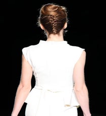 We've shown you how to create a French-braided topknot, but hairstylist Peter Gray for Moroccanoil took the look to the next level, curling and pinning the top of the hair for volume. The result: an incredibly modern, glamorous take on the french twist silhouette.
Photo: David Webber for Moroccanoil badgley-photoshop