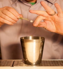 Step 3: Pinch and slide in the rosemary leaves. Then, add ice and shake things up! 04_006_Cocktail#1_Vanilla_steps