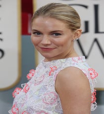 Sienna Miller
After having a beautiful baby with her fiancé, one of our favorite Brits made a triumphant return to the red carpet looking (is it possible?) even more glowy and amazing than before. Giuliana Rancic called her out on the carpet for wearing almost no makeup — but we heard that she used Chanel Vitalumière foundation and St. Tropez Rose Skin Illuminator to further bring out her post-baby beauty. Sporting a fresh face and a minimal, slicked-back hairstyle, Sienna looked stunning in the simplest way possible, and we love her for it.
Photo: Rex/Rex USA golden-globes-beauty-sienna-miller