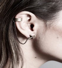Luv AJ Crystal Cross Ear Cuff, $89, available at The Trend Boutique. yhst-81269699784480_2207_187968041