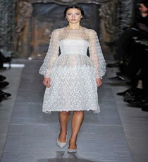 Adele already wore a Valentino dress to the Grammys, and we think she should continue the love affair with this long-sleeved, bell-skirted, sheer frock. val_HCss13_132
