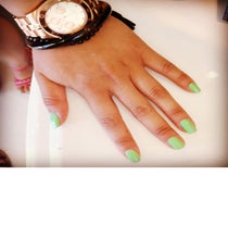 Tiffany makes us green with envy with her colorful digits, which we spotted while cruising the mall one afternoon. Photographed by Us Tiffany