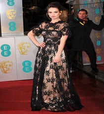 Lily James
This Downton Abbey star (she plays temptress Lady Rose MacClare, in case you aren't among the obsessed) enhanced her English Rose status with a flowing, black-lace gown. The high neck and puff sleeves kept it demure while the champagne-coloured satin underneath made it anything but. One to watch.
Photo: David Fisher/Rex/Rex USA rexusa_1235223km