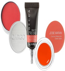 Coral + Orange Cheeks
Want to feel like you’ve instantly stepped onto the sandy shores of a distant island? Us too, trust. A coral cheek feels instantly vacation-inspired, is flattering on every skintone, and can be paired with just about any lip color. “If you have a lighter skin tone, choose a slightly sheer coral with pink undertones," says Cherman. For those with medium and darker skintones, she recommends choosing one with even more "orange punch.” We definitely like the sound of that.
Cargo Blush in Laguna, $29, available at Macy's;
Becca Beach Tint in Grapefruit, $25, available at Sephora;
Josie Maran Coconut Watercolor Cheek Gelée in Coral Oasis, $22, available at Sephora.
CoralOrange_cheeks