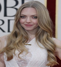 Amanda Seyfried
Those eyes, those lips, that hair, that bosom! Amanda lucked out in the gorgeous-genes department, so we loved that she went completely minimal in every way, allowing her natural beauty to shine through. The only slightly out-there touch? Her full-on blush-glittered eyelids that added a glam factor to her simple look. We always knew Amanda sparkled, but...wow.
Photo: Rex/Rex USA golden-globes-beauty-amanda-seyfried