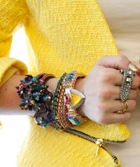 22 Wrists, 100+ Pieces Of Blingin' Arm Candy opener