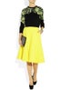 For-Work_With-Graphic-Sweater_JW-Anderson-Pleated-ALine-Skirt_NetPorter_815slide