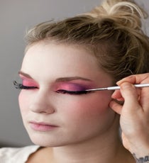 After the lashes have been affixed and the glue is dried, go over the line with your black liner to blend the seam of the lashes into your natural lash line. 13_HalloweenLook1_091512_449