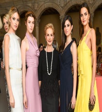Carolina Herrera looks stylish stoic surrounded by four muses. Photo: Courtesy of The Metropolitan Museum of Art/BFAnyc.com 2