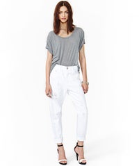 10 Awesome Pairs Of White Jeans To Brighten Up Your Summer opener